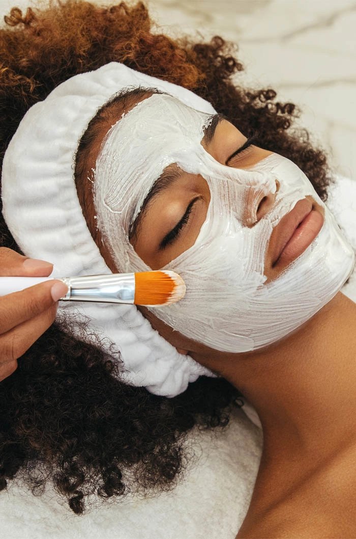 a woman getting a facial eleve plastic surgery